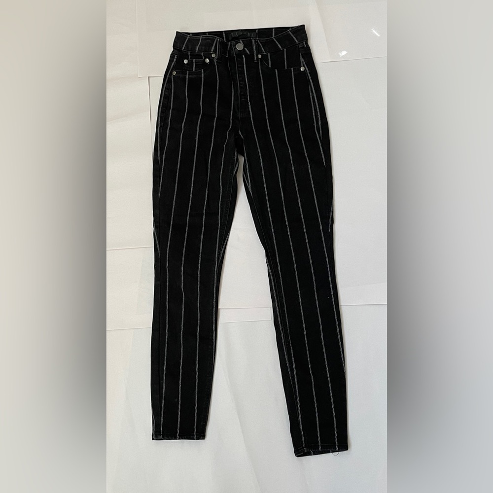 Size 25 skinny black striped pants.
